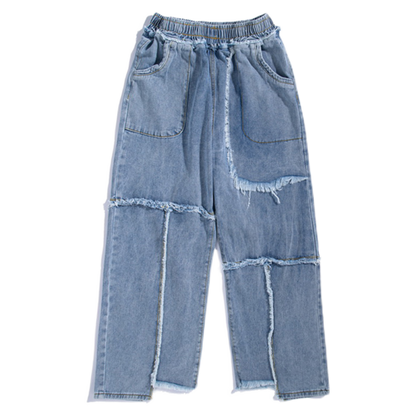 Distressed washed jeans with raw edges