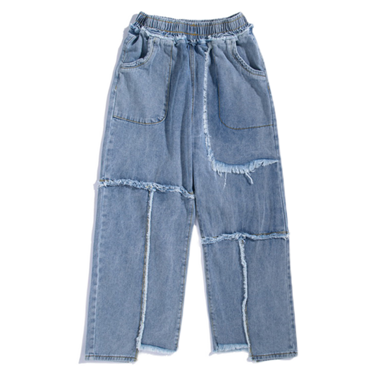 Distressed washed jeans with raw edges