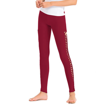 Pantalones de yoga Pantalones ajustados tejidos huecos para mujer