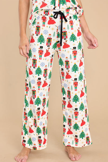 Ropa de dormir de dos piezas con botones y estampado navideño blanco