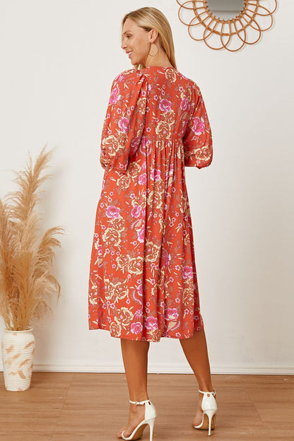 Robe florale à manches mi-longues et col noué