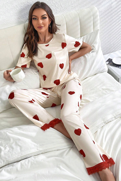 Conjunto de pijama con pantalones y camiseta con dobladillo de encaje y estampado de corazones de San Valentín blanco