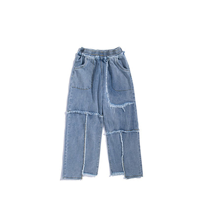 Distressed washed jeans with raw edges