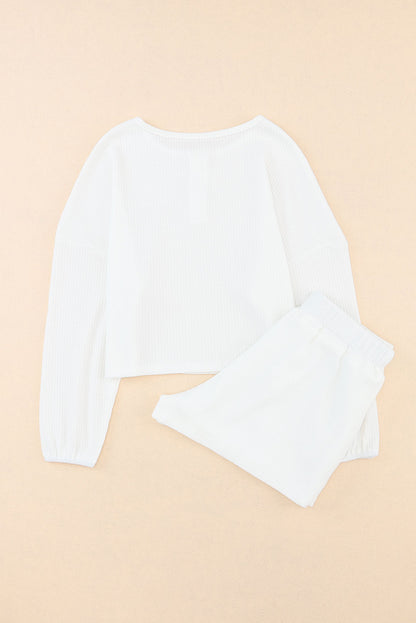 Conjunto de estar por casa corto y pantalones cortos de manga larga con botones y punto tipo gofre blanco