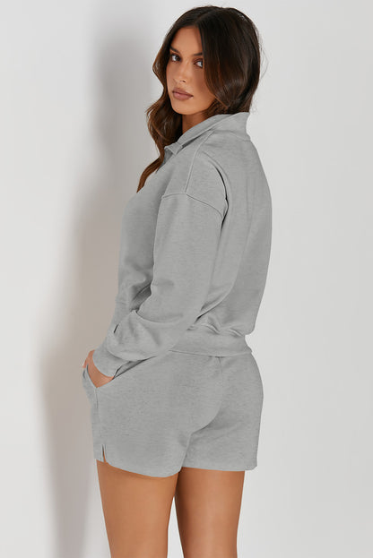 Ensemble actif sweat-shirt et short à demi-boutons