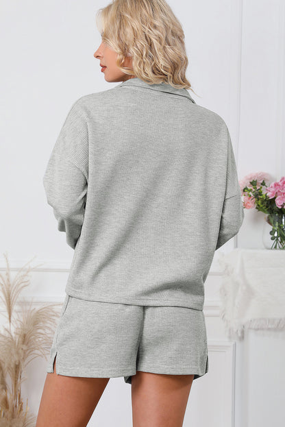 Ensemble sweat-shirt zippé côtelé gris et short taille haute