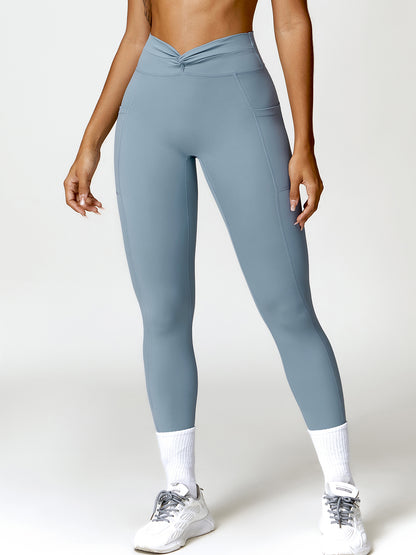 Pantalon actif torsadé taille haute avec poches