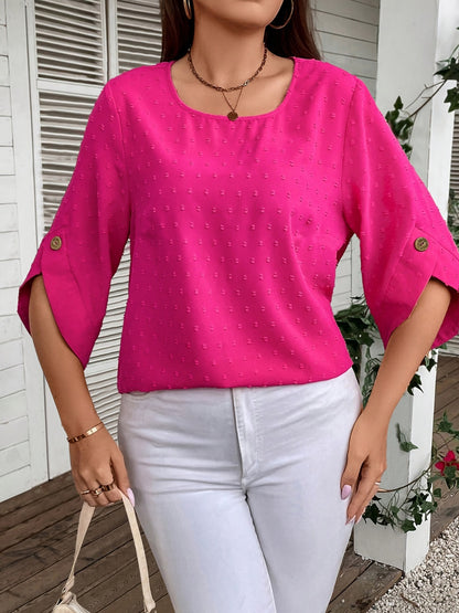 Blusa con cuello redondo y lunares suizos