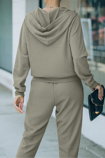 Conjunto de pantalón y top de manga larga con cremallera