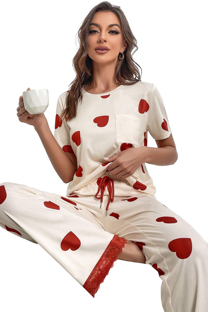 Conjunto de pijama con pantalones y camiseta con dobladillo de encaje y estampado de corazones de San Valentín blanco