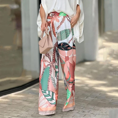 Traje con pantalones con pernera ancha y cintura alta con estampado de moda y manga de murciélago con cuello en V