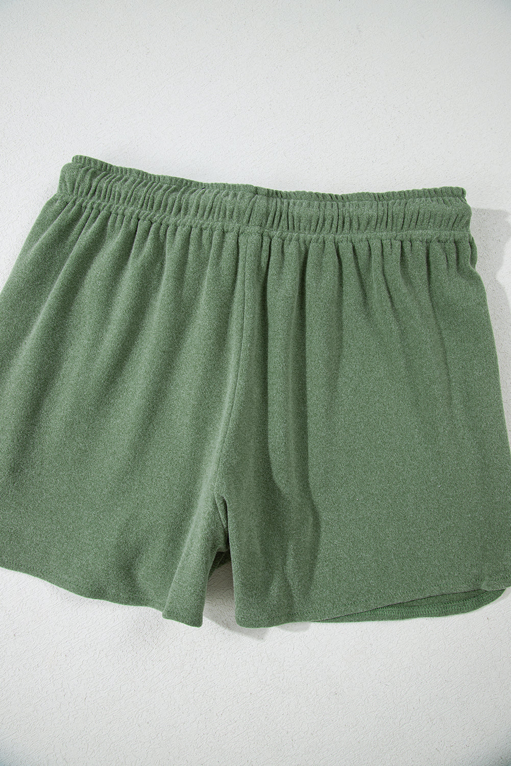 Ensemble deux pièces pull court et short en polaire vert