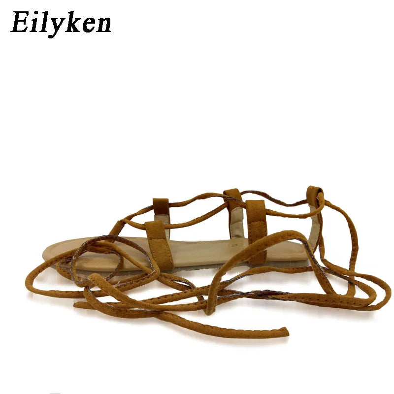 Eilyken été sandales romaines sangle croisée grand genou haut Bondage string plat femmes sandales tongs noir abricot