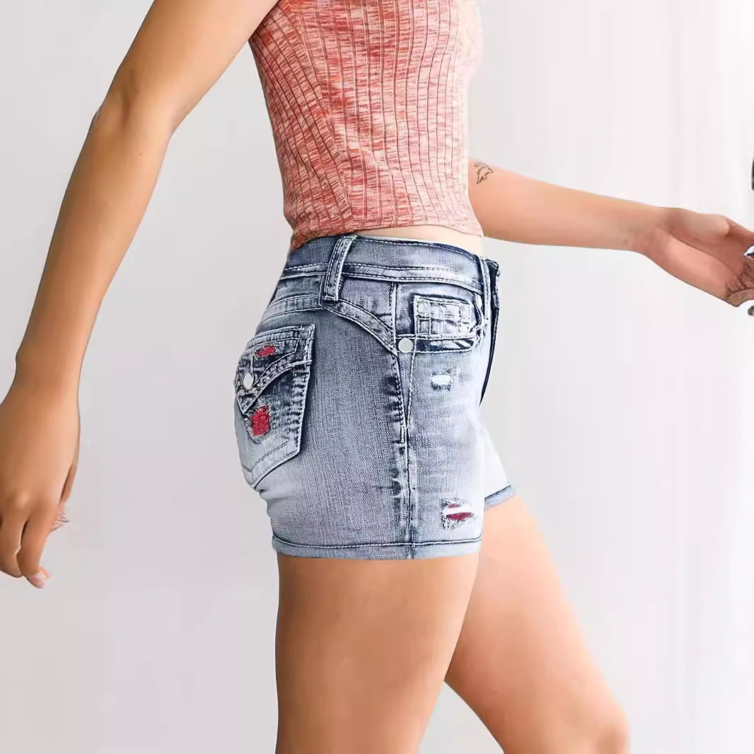 Short en denim lavé brodé pour femme