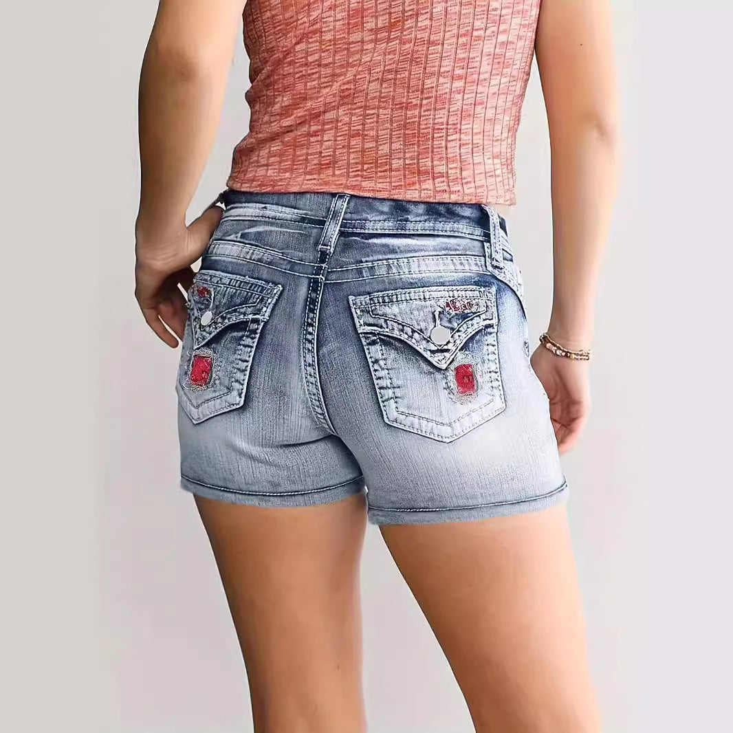 Short en denim lavé brodé pour femme