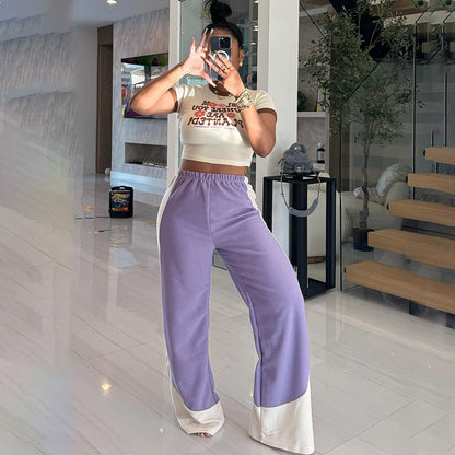 Pantalones anchos y holgados con cintura elástica y rayas de colores combinados para mujer