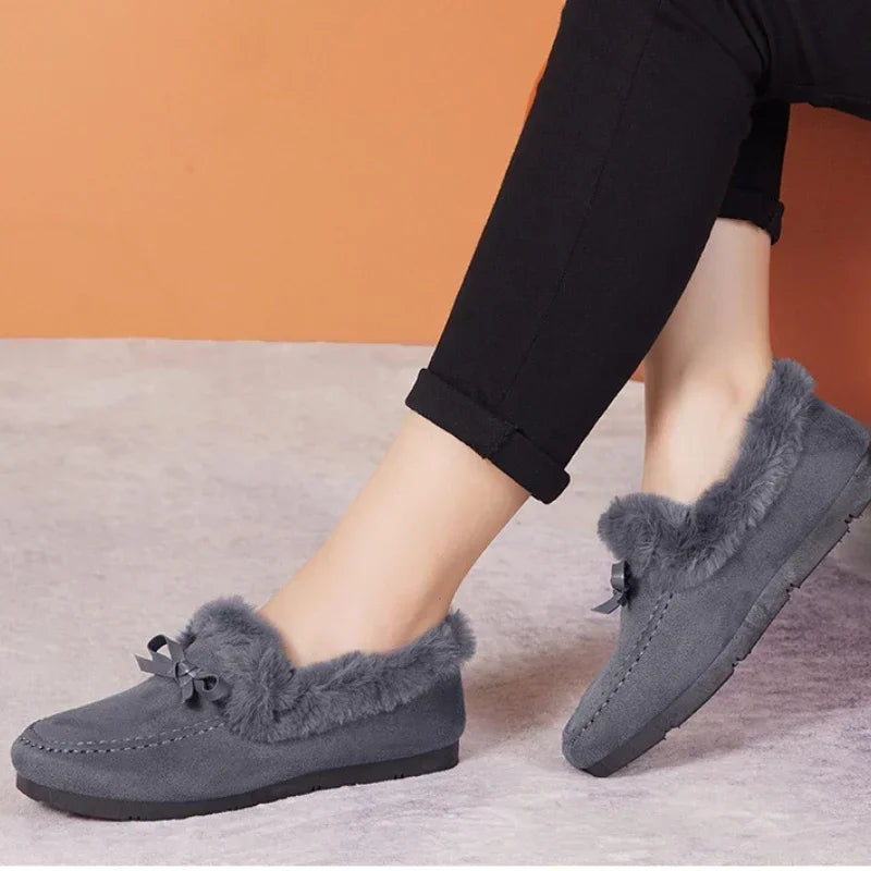 Zapatos informales de invierno para mujer, mocasines nuevos, mocasines planos suaves antideslizantes, cómodos y a la moda, zapatos cálidos de felpa con lazo, zapatos de algodón para mujer