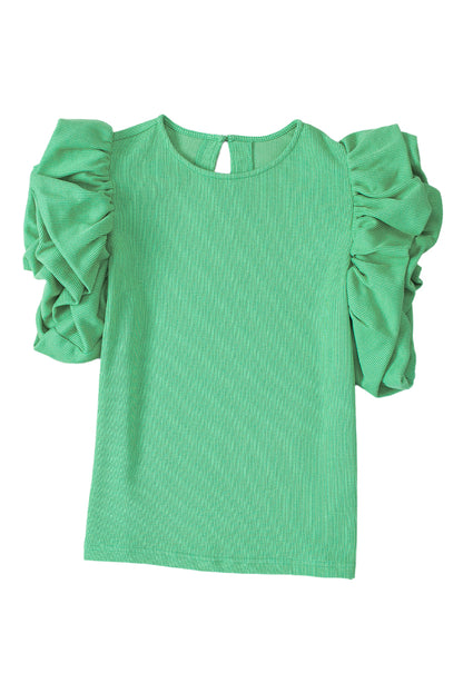 Blouse verte en tricot côtelé à manches bouffantes à volants