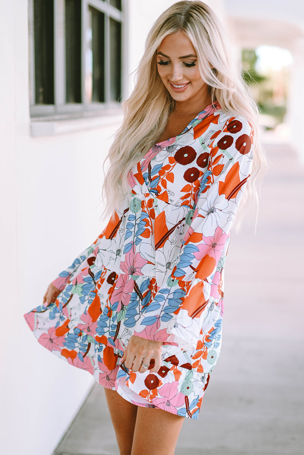 Minivestido con gradas con print de flores blanco