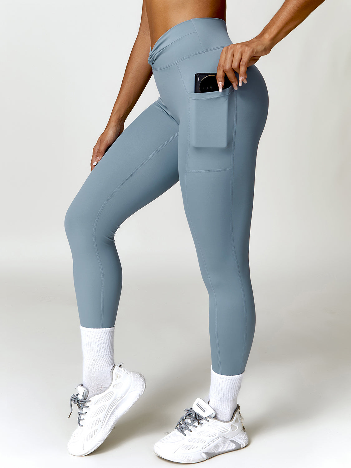 Pantalon actif torsadé taille haute avec poches