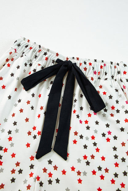 Conjunto de pijama de manga larga y pantalones con estrella ribeteada en contraste en blanco