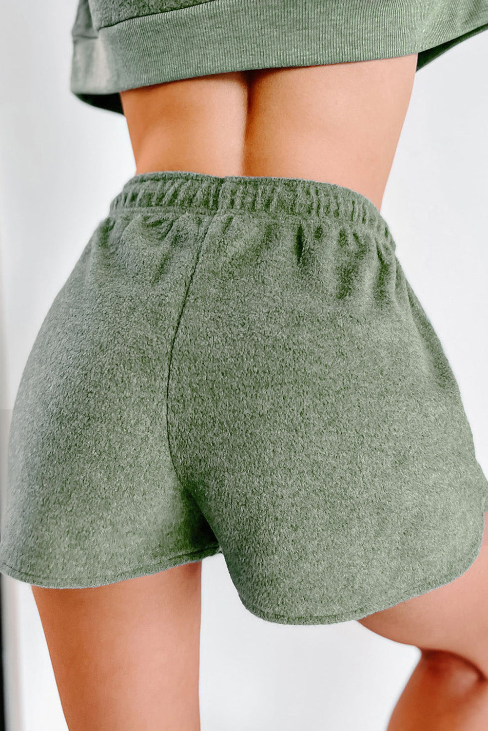 Ensemble deux pièces pull court et short en polaire vert