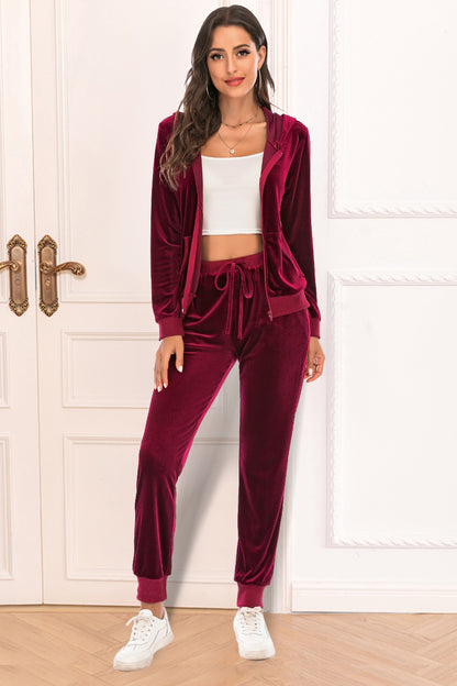 Conjunto de chaqueta y pantalón con capucha y cremallera